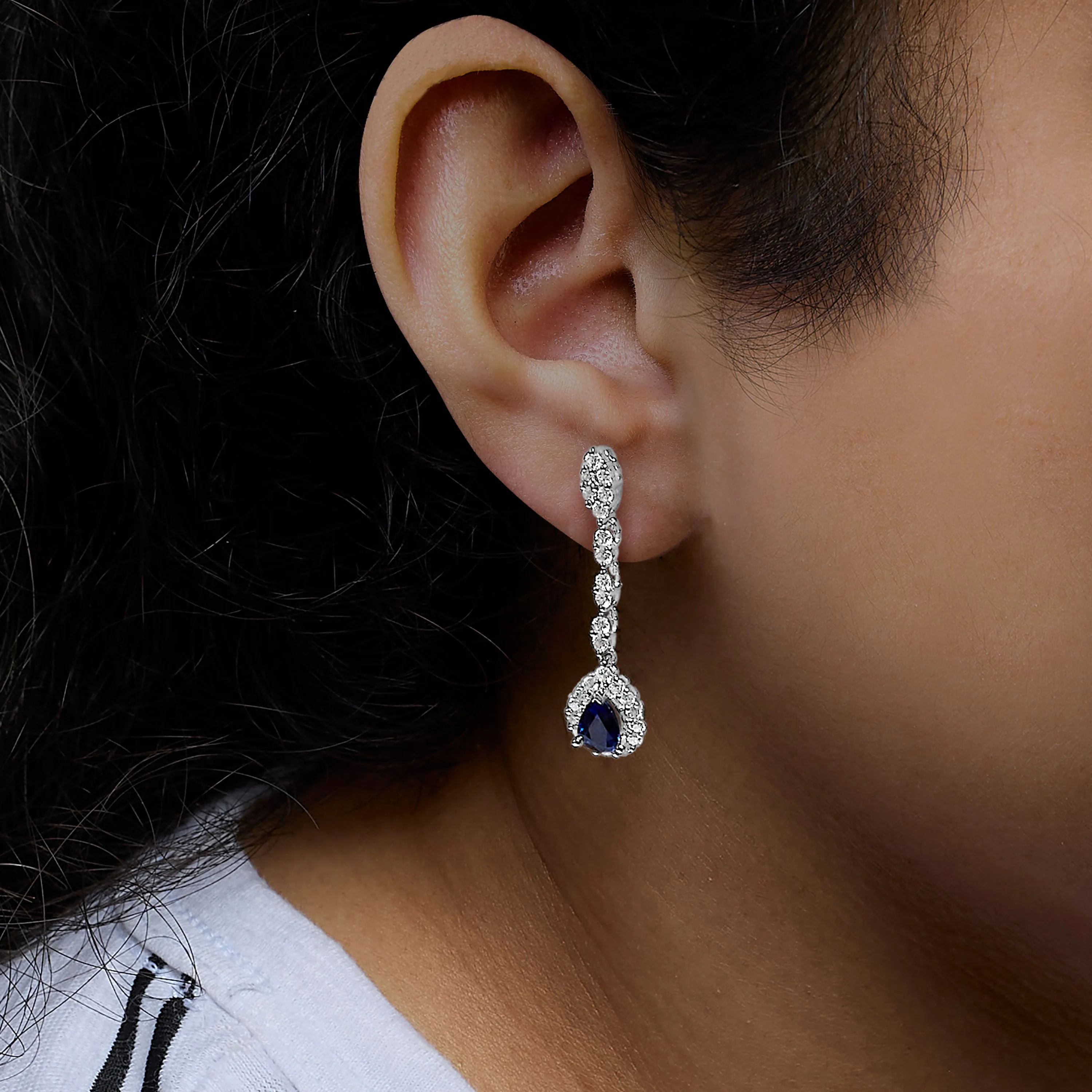 18K White Gold 1 3/5 Cttw Diamond and 7X5 MM Pear Shaped Blue Sapphire 1 1/3 Inch Drop and Dangle Halo Earrings